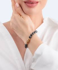 Police women gold bracelet with black beads 